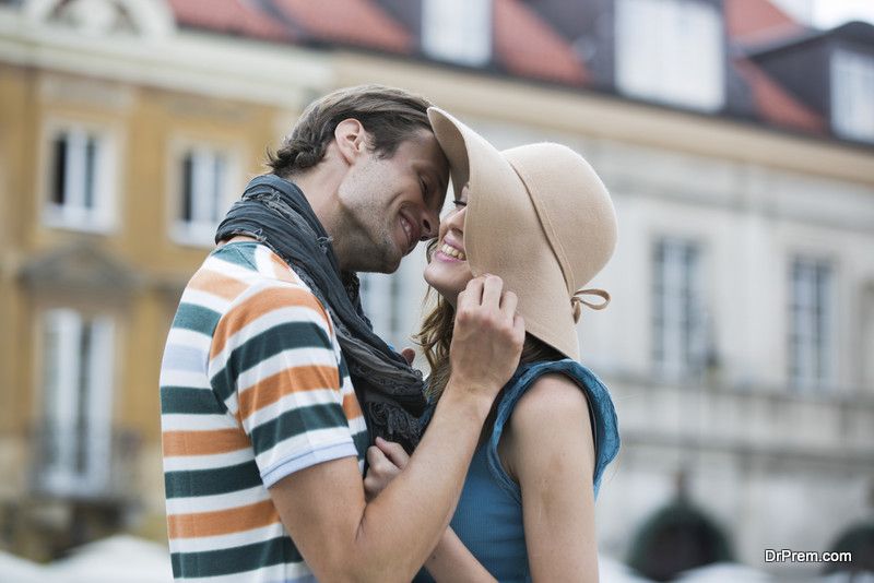 Romantic young man kissing woman in poland